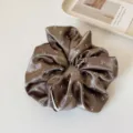 Brown satin hair scrunchie with white floral print, elegant ponytail holder for women. - Dark Gray Flower
