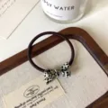 Chic elastico per capelli con fiocco leopardato da donna, grazioso porta coda di cavallo. - Elastico Capelli Fiocco Bianco e Nero