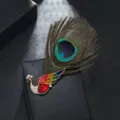 Elegant peacock brooch featuring natural feather crystal rhinestone suit coat dress shawl pin jewelry. - Red