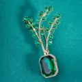Detailansicht der Vintage Kristall Blumenkorb Brosche, elegante grüne Strass Legierung. - Grüner Stil / 1 Stück