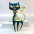 Enamel cute cat brooch detail shot featuring gold tone black body orange eyes and shiny rhinestones - Style 2 Black Cat with Eyes / 1.8x3cm