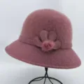 Women winter knitted bucket hat stylish mauve wool blend bowler hat with flower decor main view - One Size / Dusty Pink With Flower Pom-Pom