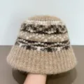 Knitted bucket hat detail showcasing the cozy fuzzy texture and ethnic winter geometric pattern. - M (56-58cm) / Khaki