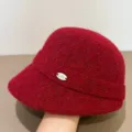 Close-up detail shot of red wool winter bucket hat, warm fisherman hat with metallic logo. - M (56-58cm) / Burgundy
