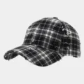 Detailed close-up view of the black and white plaid distressed baseball cap texture. - Adjustable / Black