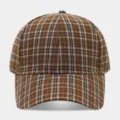 Close-up detail of vintage brown plaid baseball cap, showing textured fabric and neat stitching. - Adjustable / Brown
