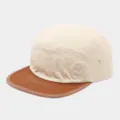 Detailed view of washed cotton 5-panel cap featuring contrast color brim and fine stitching. - Adjustable / Beige