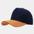 Close-up detail shot of a navy blue and brown suede contrast 5-panel high-top baseball cap. - Adjustable / Navy Body With Caramel Brim
