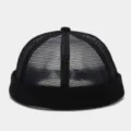 Close-up detail view of the black breathable mesh docker cap and sailor hat design. - Adjustable / Black