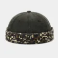Close-up detail of the vintage leopard print brim docker cap, stylish brimless design. - Adjustable / Gray