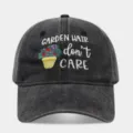 Washed black dad hat featuring embroidered gardening floral design and slogan text on front. - Adjustable / Black