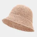 Detail view of the hollow-out straw bucket hat, showing the breathable woven texture and beige color. - One Size / Light Pink