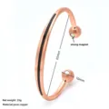 Detail view of the rose gold copper magnetic cuff bracelet showing dimensions and magnets. - Copper Black