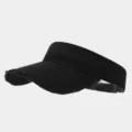 Detailed close-up of the black washed distressed sun visor hat showing raw edge brim design. - Adjustable / Solid Black