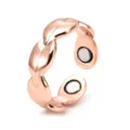 Close-up detail of magnetic copper ring showing polished rose gold surface and inner magnets. - 2 Magnets / Rose Gold