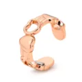 Detailed close-up of the rose gold magnetic ring featuring a double heart and hand hugging design. - Rose Gold