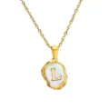 Detailed close-up of the irregular mother-of-pearl letter L pendant necklace craftsmanship. - L