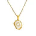 Gold stainless steel letter O necklace with mother of pearl irregular pendant detail view. - Letter O