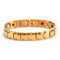 Detail view of the luxury gold stainless steel magnetic therapy bracelet with double bevel links. - Gold