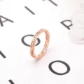Stainless steel rose gold Greek key hollow ring for women, chic geometric fashion jewelry. - Size 6 / Rose Gold