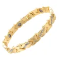 Detailed view of gold tone magnetic leaf bracelet with sparkling rhinestone inlay details. - Gold