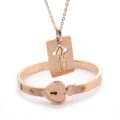 Rose gold stainless steel couple bracelet necklace set with heart lock and crystal diamonds. - Rose Gold