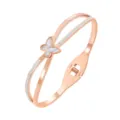 Rose gold stainless steel crossover bangle with white shell butterfly and sparkling crystals. - Rose Gold