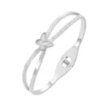Detail view of stainless steel butterfly cuff bracelet with shell inlay and pavé diamond line. - Silver