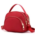 Red nylon mini shell crossbody bag for women, lightweight commuting shoulder bag with gold zippers. - Red