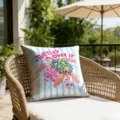 Outdoor patio detail view featuring a colorful turtle patterned decorative pillow on a chic wicker armchair. - 18x18 Inch / 1 Piece / Turtle Style (CDR493-20)