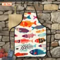 Colorful fish printed kitchen cooking apron detail view showing vibrant pattern design. - Fun Fish