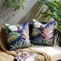Outdoor waterproof tropical plant throw pillow cover detail view on patio sofa setup. - Dark Blue Palm Leaf Flower (DYM472-1) / 45x45cm
