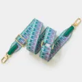 Courroie de sac tissée colorée à longueur réglable, quincaillerie dorée et embouts en cuir vert. - Vert
