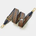 Adjustable woven bag strap with geometric V pattern and gold hardware for shoulder crossbody bags. - Sapphire Blue