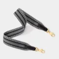 Black and white woven replacement bag strap with gold-tone hardware for stylish shoulder bags. - Black Strap Gold Buckle