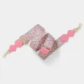 Adjustable wide replacement bag strap with pink patterned webbing and gold hardware. - Light Gold Buckle / Pink