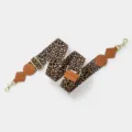 Close-up detail of leopard print wide bag strap with brown leather and gold hardware. - Light Gold Buckle / Brown
