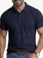 Polo da uomo blu scuro a maniche corte vista dettaglio, colletto classico e bottoni fini. - Taglia M / Top / Blu navy