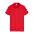 Close-up detail view of red men's short-sleeve polo shirt with classic collar and buttons. - S / Tops / Red
