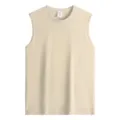 Closeup of the soft cotton tank top neckline and fabric texture, ideal detail view. - S / Tops / Apricot