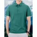 Green summer polo shirt detail showing breathable fabric, classic collar and comfortable fit. - Green