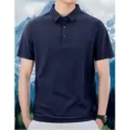 Detail view of men's summer short sleeve navy blue polo shirt collar texture close up. - Dark Blue