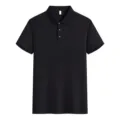 Men's classic solid black short sleeve cotton polo shirt detail showcasing the lapel buttons. - M / Tops / Black