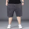 Pantaloncini di jeans grigio scuro da uomo, bermuda larghi taglio dritto stile streetwear. - 29 / Pantaloni e gonne / Grigio nero