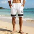 Detail view of men's linen-like beach shorts featuring Nordic rune print by the seaside ocean view - S / White