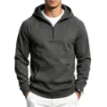 Close-up view showing the quarter-zip closure, structured hood, and refined stitching details. - S / Tops / Iron Gray