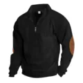 Detailed view of black half-zip sweater with brown elbow patches and collar tag. - S / Black