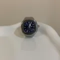 Orologio ad anello in metallo argentato con quadrante blu, originale accessorio da dito. - Quadrato Quadrante Blu
