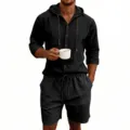 Close-up view of the black men's linen hooded shirt and shorts set showing fabric details. - S / Black