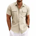 Detail view of men's short sleeve utility shirt with lapel and dual chest pockets. - Apricot